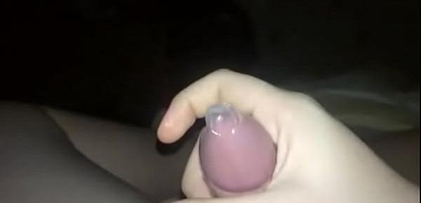  teen twink puts on condom and masturbates